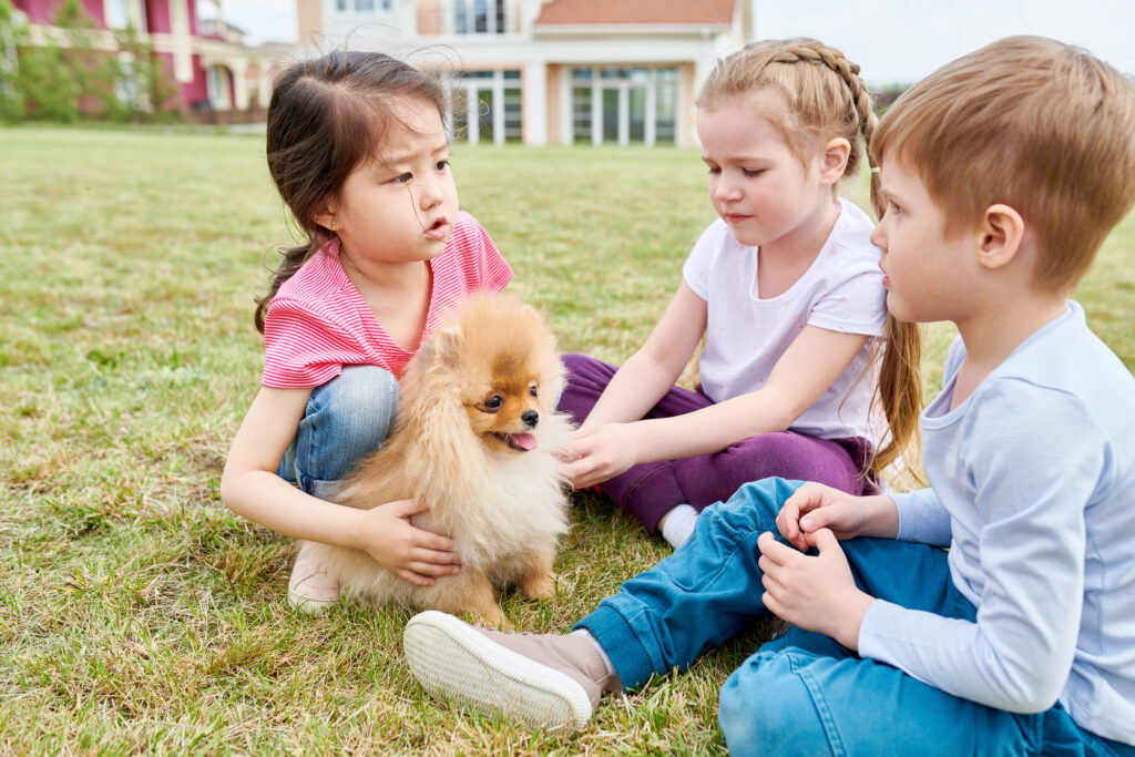 Kids Playing with Puppy